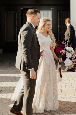 A young and adventurous couple dresses up in their groom and bridal wedding attire on their wedding day. They were photographed by Hannah Lylene Photography, a Dallas Fort Worth (DFW) Elopement/Wedding photographer as a part of their intimate elopement/wedding Latter Day Saint (LDS) ceremony.