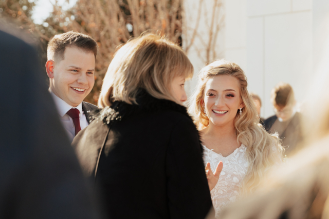 A young and adventurous couple dresses up in their groom and bridal wedding attire on their wedding day. They were photographed by Hannah Lylene Photography, a Dallas Fort Worth (DFW) Elopement/Wedding photographer as a part of their intimate elopement/wedding Latter Day Saint (LDS) ceremony.