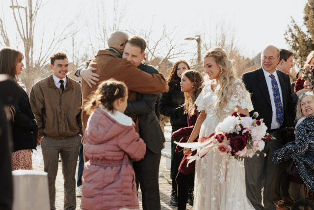 A young and adventurous couple dresses up in their groom and bridal wedding attire on their wedding day. They were photographed by Hannah Lylene Photography, a Dallas Fort Worth (DFW) Elopement/Wedding photographer as a part of their intimate elopement/wedding Latter Day Saint (LDS) ceremony.