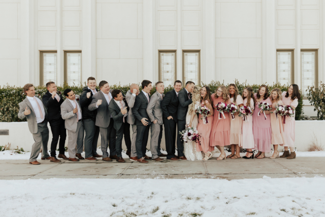 A couple dresses up in their wedding attire on their wedding day to take their candid and natural documentary styled photos with their bridal party. Photographed by Northern Texas (DFW) photographer Hannah Lylene Photography.