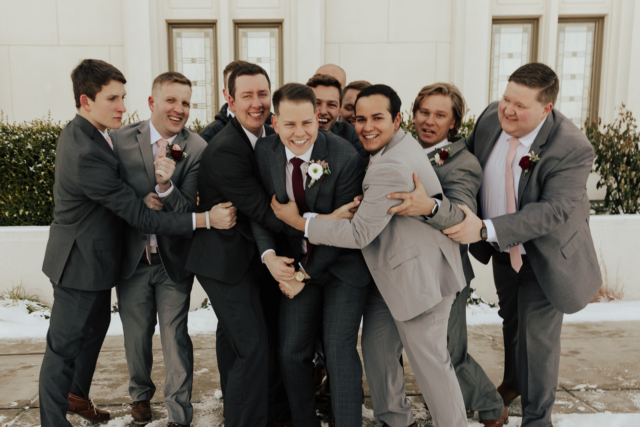 A couple dresses up in their wedding attire on their wedding day to take their candid and natural documentary styled photos with their bridal party. Photographed by Northern Texas (DFW) photographer Hannah Lylene Photography.