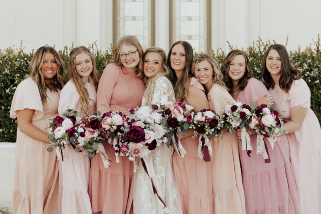 A couple dresses up in their wedding attire on their wedding day to take their candid and natural documentary styled photos with their bridal party. Photographed by Northern Texas (DFW) photographer Hannah Lylene Photography.