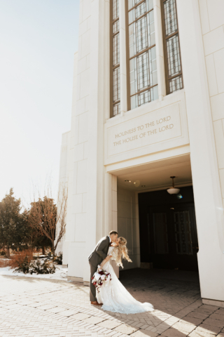 A couple dresses up in their wedding attire on their wedding day to take their romantic and natural documentary styled photos. Photographed by Hannah Lylene Photography.