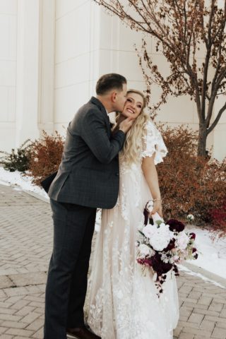 A couple dresses up in their wedding attire on their wedding day to take their romantic and natural documentary styled photos. Photographed by Hannah Lylene Photography.