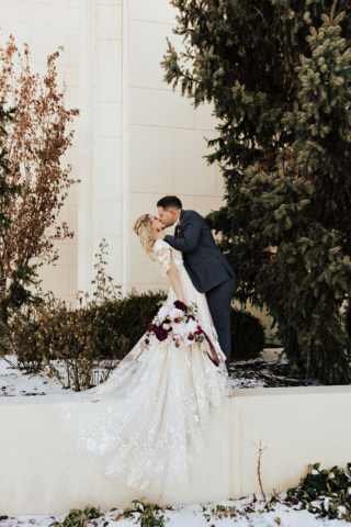 A couple dresses up in their wedding attire on their wedding day to take their romantic and natural documentary styled photos. Photographed by Hannah Lylene Photography.