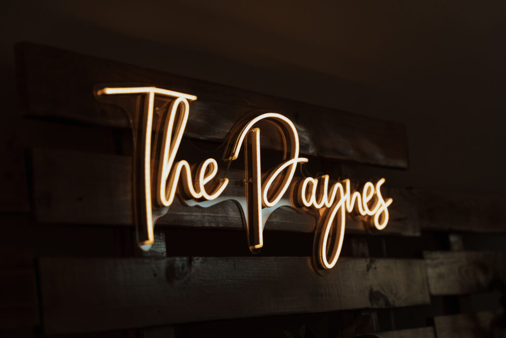 Detail Shots of different aspects of a couple&rsquo;s wedding day with a neon sign. Photographed by Northern Texas (DFW) photographer Hannah Lylene Photography.
