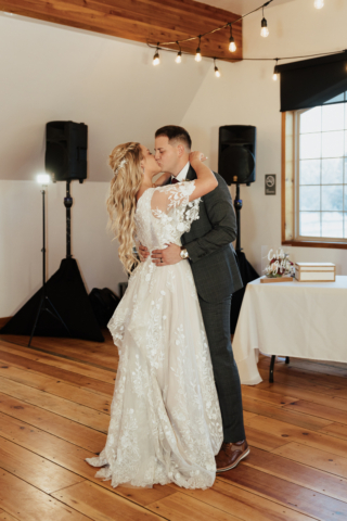 A couple dresses up in their wedding attire on their wedding day to take their romantic and natural documentary styled photos. Photographed by Hannah Lylene Photography.