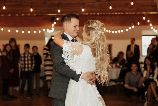 A couple dresses up in their wedding attire on their wedding day to take their romantic and natural documentary styled flash photos. Photographed by Hannah Lylene Photography.