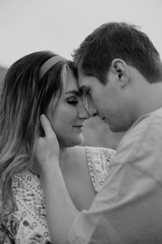 A pregnant mother and father in the Northern Texas mountains taking their maternity photos. Photography by Dallas Photographer Hannah Lylene Photography