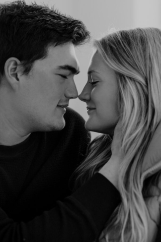 0N4A5148-Edit-For Web-2 A couple in neutral attire at the Lumen Room Studio in Fort Worth, Texas get engaged surrounded by baby’s breath. Photography by Hannah Lylene Photography.