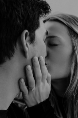 0N4A5288-Edit-For Web-2 A couple in neutral attire at the Lumen Room Studio in Fort Worth, Texas get engaged surrounded by baby’s breath. Photography by Hannah Lylene Photography.
