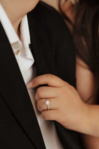 circle-cut-diamond-wedding-band-ring A couple in neutral attire at Bass Hall kiss and run around for engagement photos.