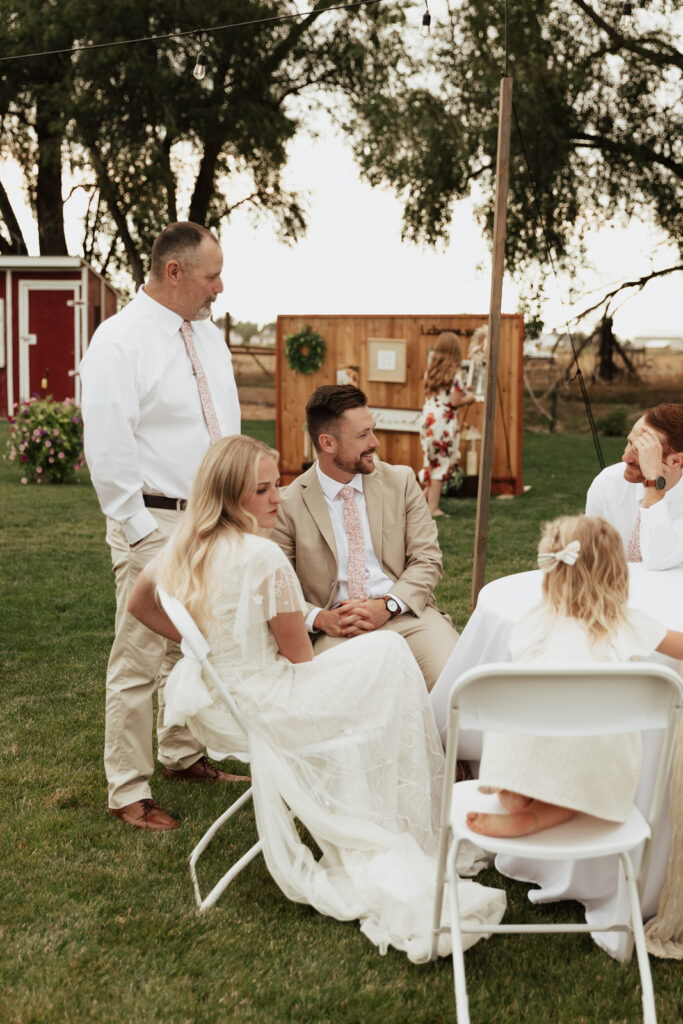 Candid and documentary style photos of wedding guests interacting with couples on their wedding day