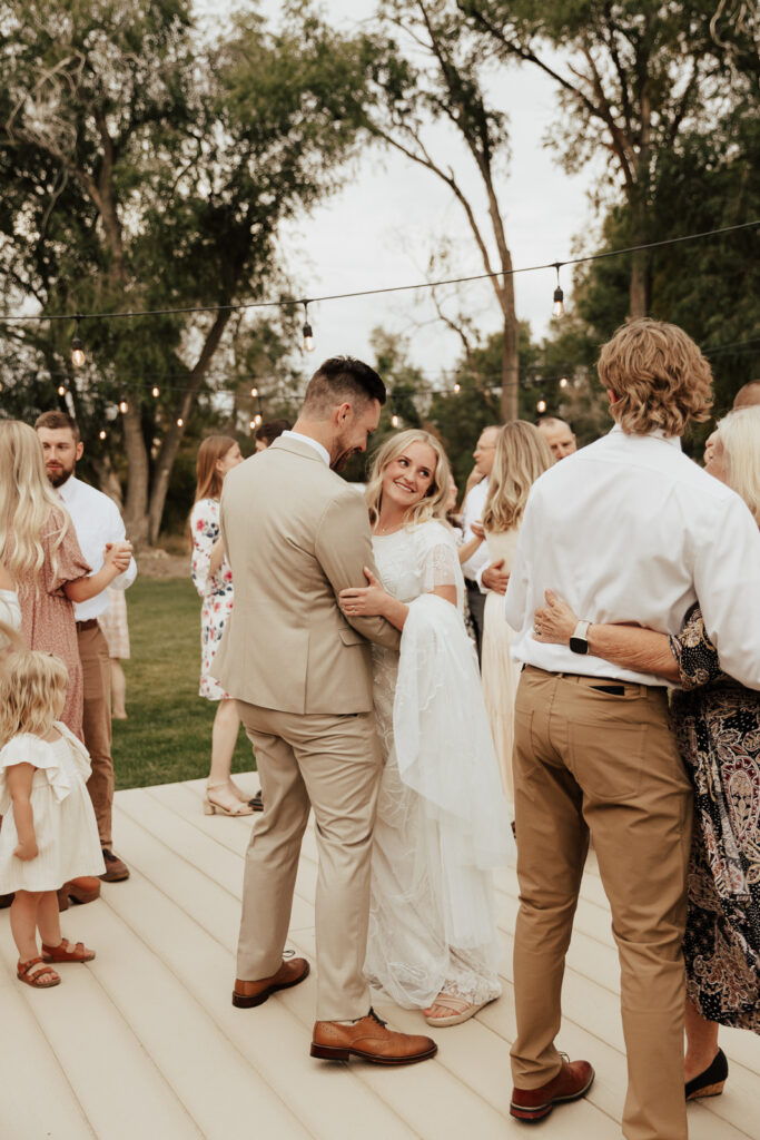 Bride and Groom dance with their guests at their DFW Intimate Wedding Elopement