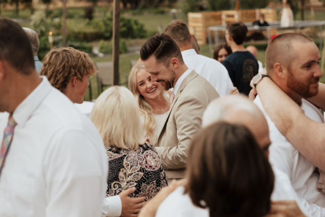 Fort-Worth-Wedding-Outdoor-Ceremony Bride and Groom dance with their guests at their DFW Intimate Wedding Elopement