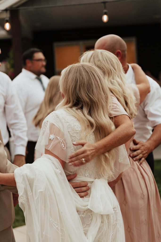 Candid and documentary style photos of wedding guests interacting with couples on their wedding day