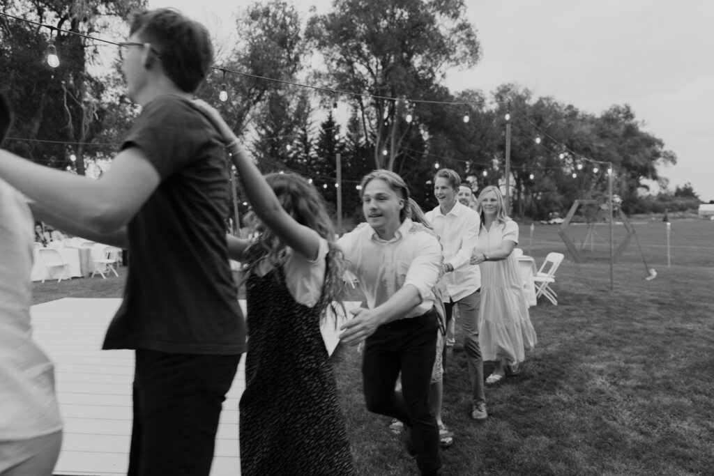 Bride and Groom dance with their guests at their DFW Intimate Wedding Elopement