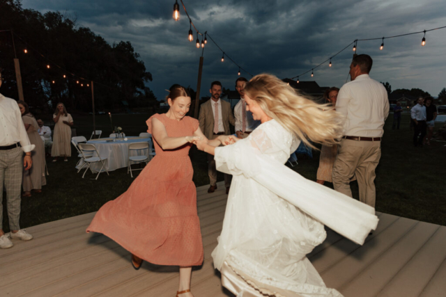 Flash-Wedding-Reception-Photography-DFW Bride and Groom dance with their guests at their DFW Intimate Wedding Elopement