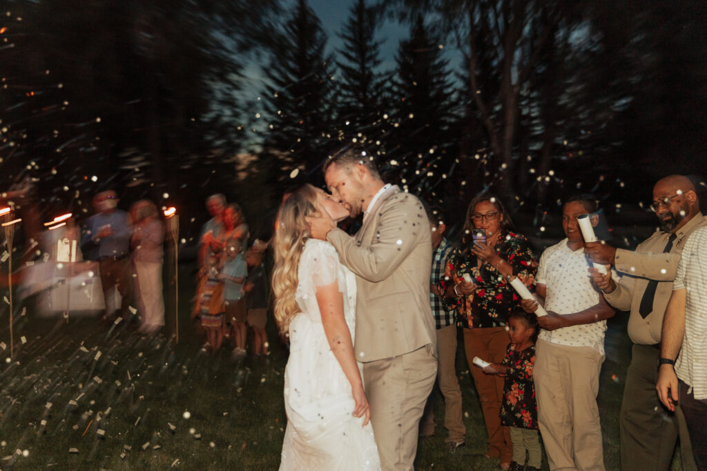Bride and Groom during their confetti wedding exit from their DFW Intimate Wedding Elopement