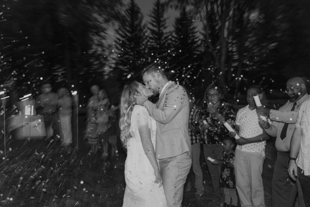 Bride and Groom during their confetti wedding exit from their DFW Intimate Wedding Elopement