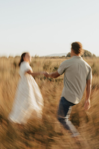 Motion Blurred image of a couple in an open field