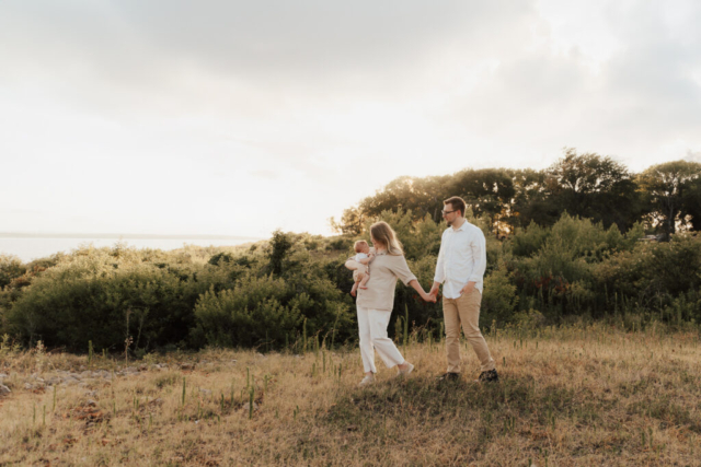 A boy and girl with their son having their family photography session in Grapevine, Texas.