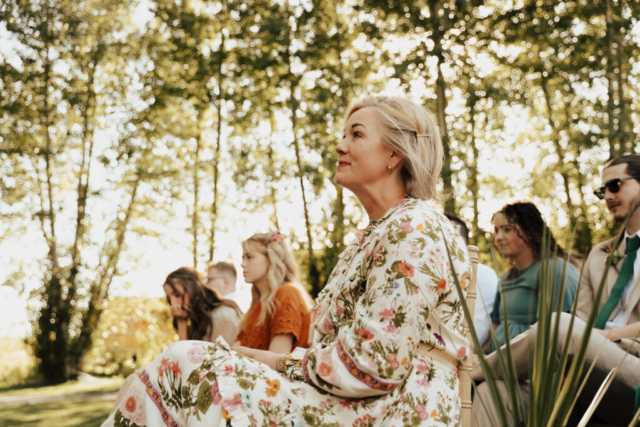 Mother of the Bride watches as her daughter gets married