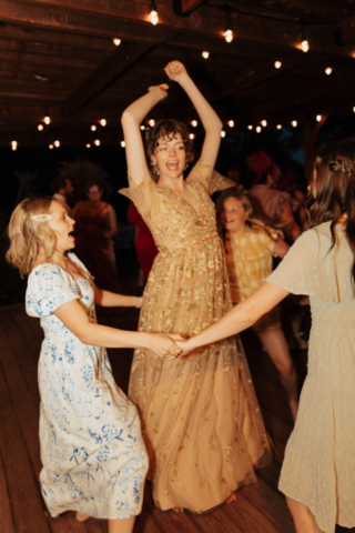 Outdoor backyard wedding ceremony dance party with night time flash photography