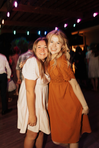 Outdoor backyard wedding ceremony dance party with night time flash photography