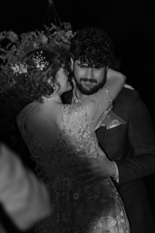 Outdoor backyard wedding ceremony dance reception with night time flash photography