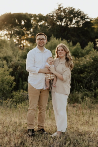A boy and girl with their son having their family photography session in Grapevine, Texas.