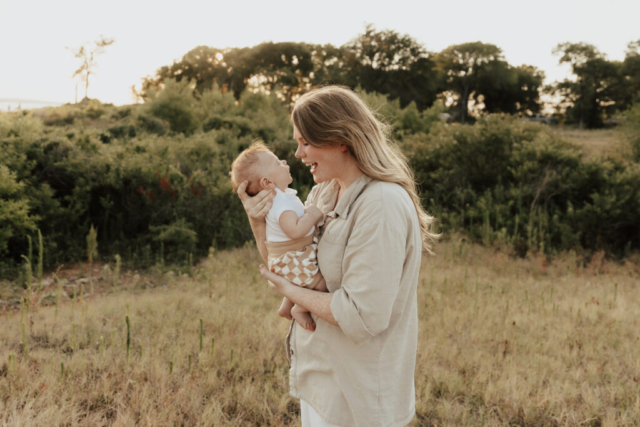 A boy and girl with their son having their family photography session in Grapevine, Texas.