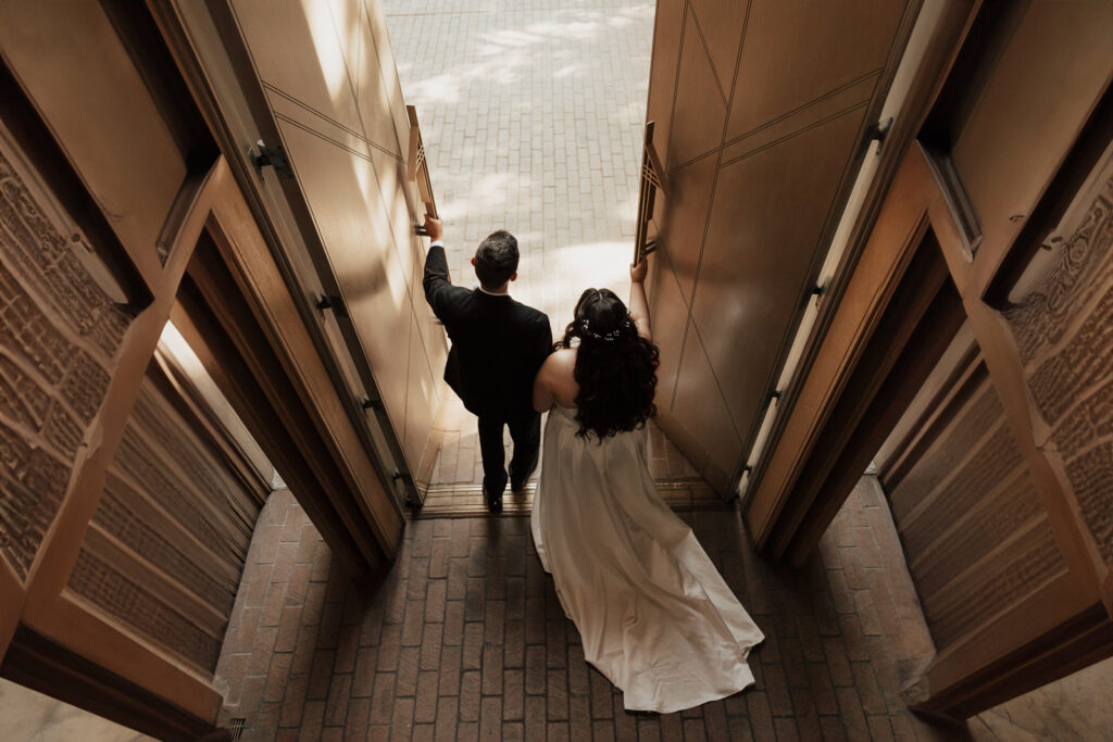 A young bride and groom at Marty Leonard Chapel on their intimate wedding day in Fort Worth, Texas.