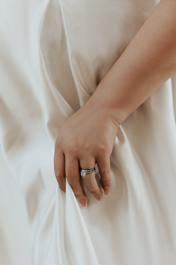A young bride and groom at Marty Leonard Chapel on their intimate wedding day in Fort Worth, Texas.