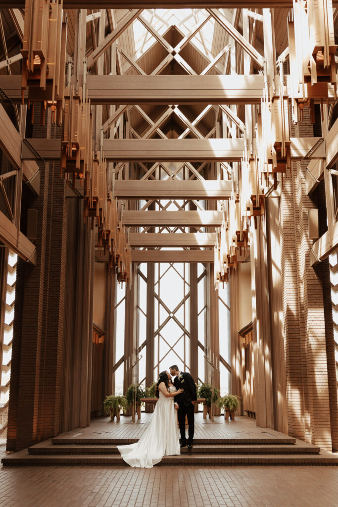 A young bride and groom at Marty Leonard Chapel on their intimate wedding day in Fort Worth, Texas.