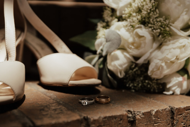 romantic-moody-wedding-details A young bride and groom at Marty Leonard Chapel on their intimate wedding day in Fort Worth, Texas.