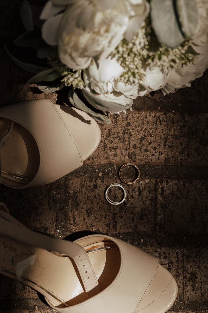 A young bride and groom at Marty Leonard Chapel on their intimate wedding day in Fort Worth, Texas.