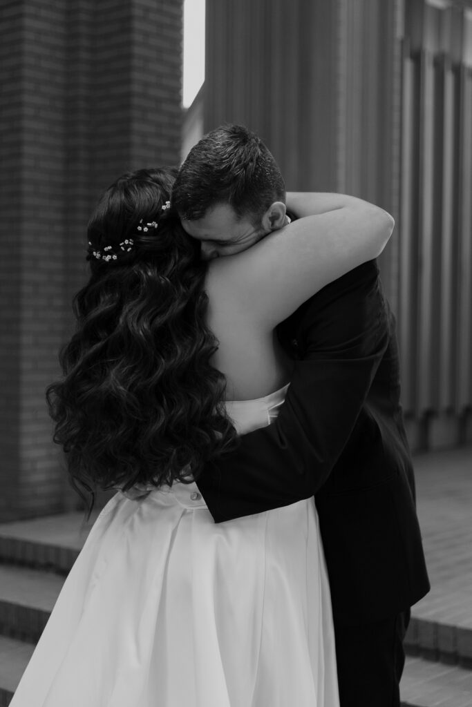 A young bride and groom at Marty Leonard Chapel on their intimate wedding day in Fort Worth, Texas.