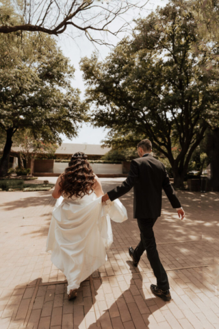 Hannah-Lylene-Dallas-Fort-Worth A young bride and groom at Marty Leonard Chapel on their intimate wedding day in Fort Worth, Texas.