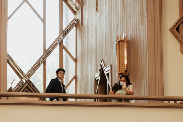 guest-candids-wedding-chapel A young bride and groom at Marty Leonard Chapel on their intimate wedding day in Fort Worth, Texas.