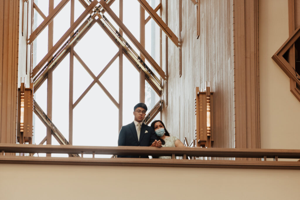 A young bride and groom at Marty Leonard Chapel on their intimate wedding day in Fort Worth, Texas.