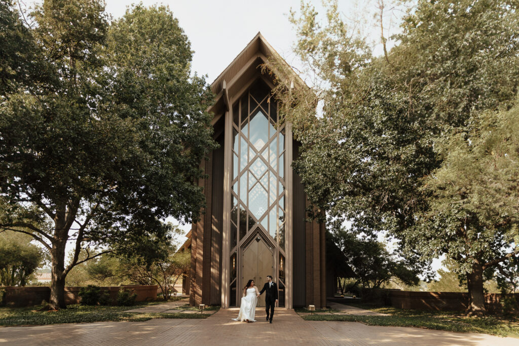 A young bride and groom at Marty Leonard Chapel on their intimate wedding day in Fort Worth, Texas.