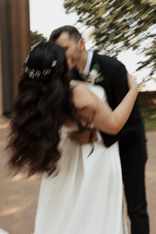 blurry-wedding-portraits-dallas A young bride and groom at Marty Leonard Chapel on their intimate wedding day in Fort Worth, Texas.