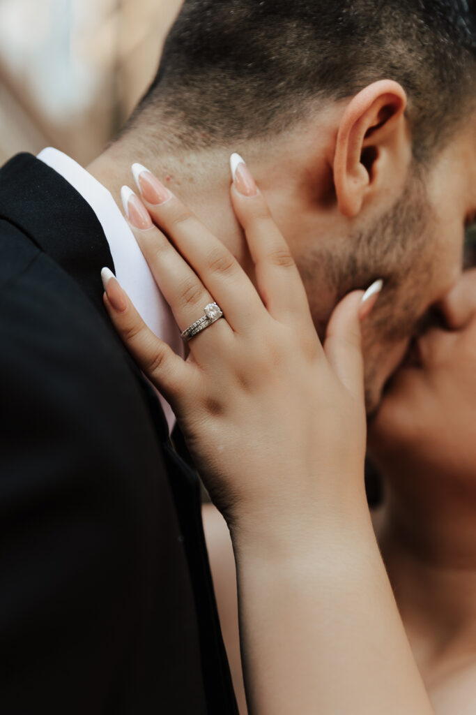 A young bride and groom at Marty Leonard Chapel on their intimate wedding day in Fort Worth, Texas.