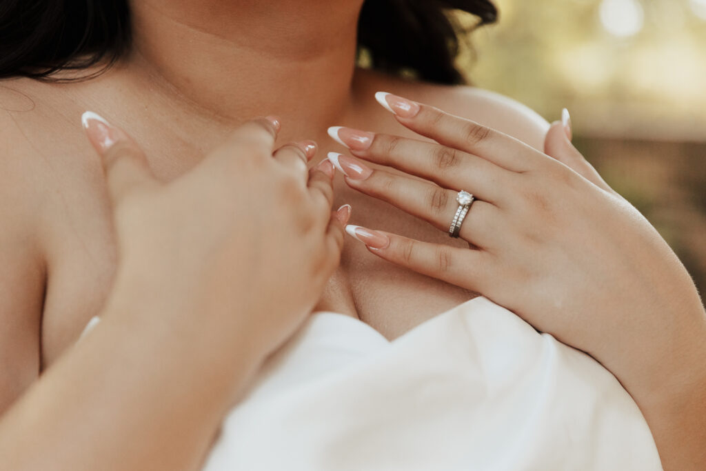 A young bride and groom at Marty Leonard Chapel on their intimate wedding day in Fort Worth, Texas.