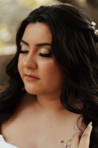 bridal-makeup-romantic-glam A young bride and groom at Marty Leonard Chapel on their intimate wedding day in Fort Worth, Texas.