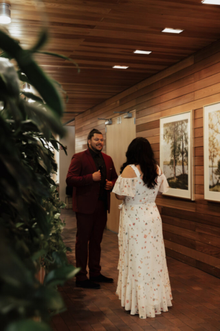 A bride and groom in their wedding attire on their wedding day take their romantic and natural documentary styled photos at the Dallas Arboretum.