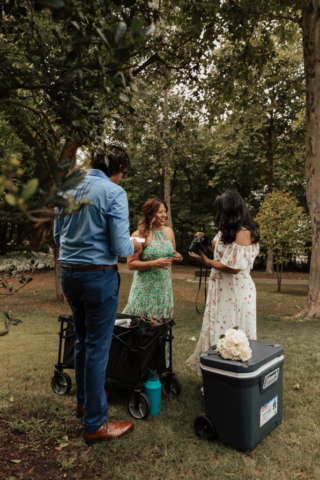 A bride and groom in their wedding attire on their wedding day take their romantic and natural documentary styled photos at the Dallas Arboretum.