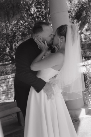 A young bride and groom at the Fort Worth Botanical Gardens on their intimate elopement wedding day in Fort Worth, Texas.