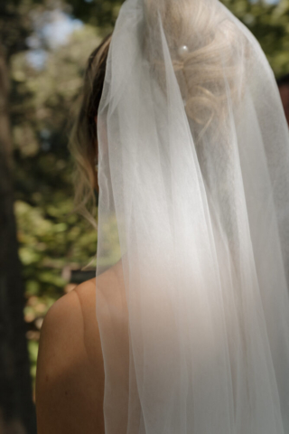 A young bride and groom at the Fort Worth Botanical Gardens on their intimate elopement wedding day in Fort Worth, Texas.